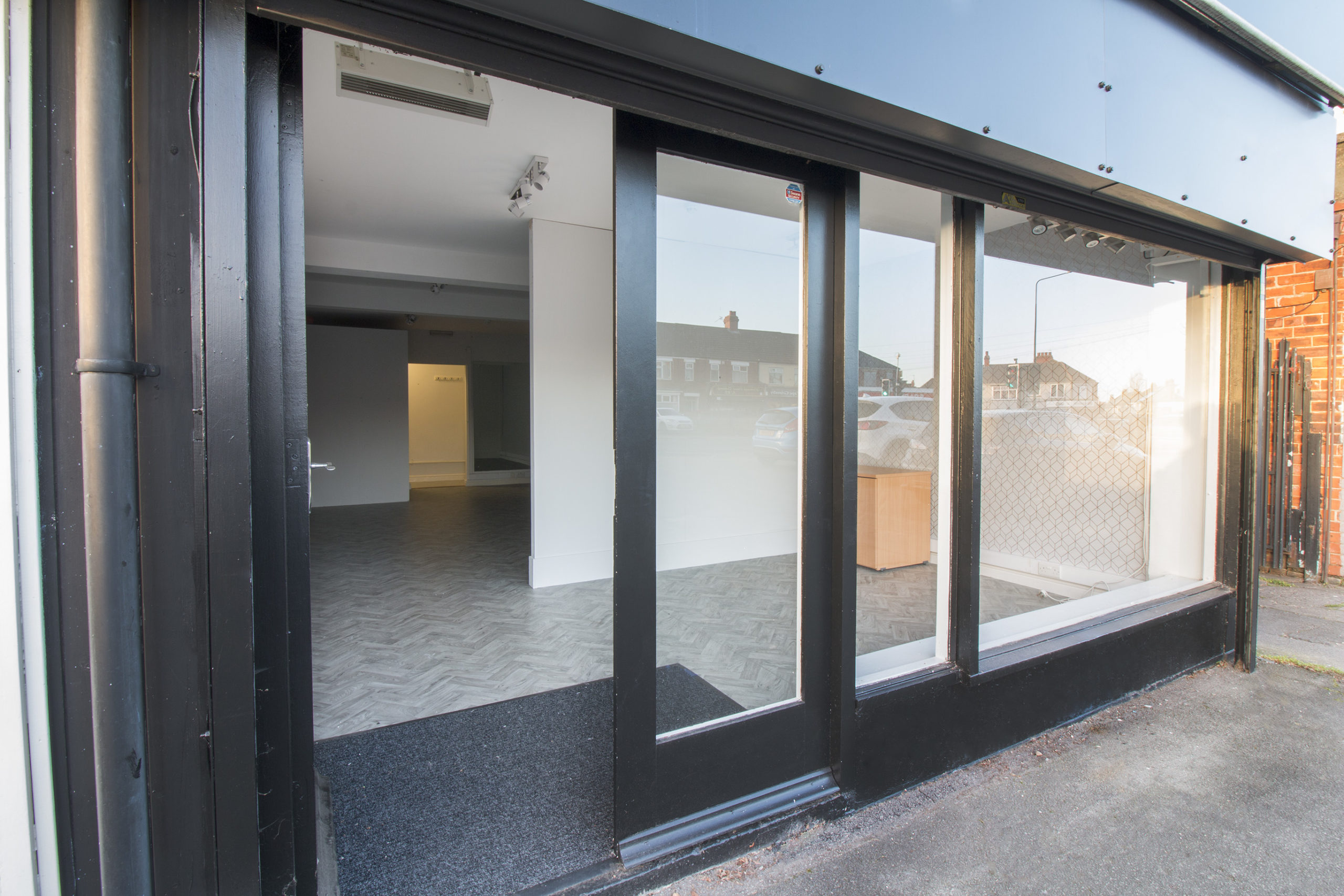 Retail unit with glass and black doors at 170 Yarbrough Road in Grimsby.