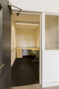 An industrial unit in Immingham with a desk and a door.