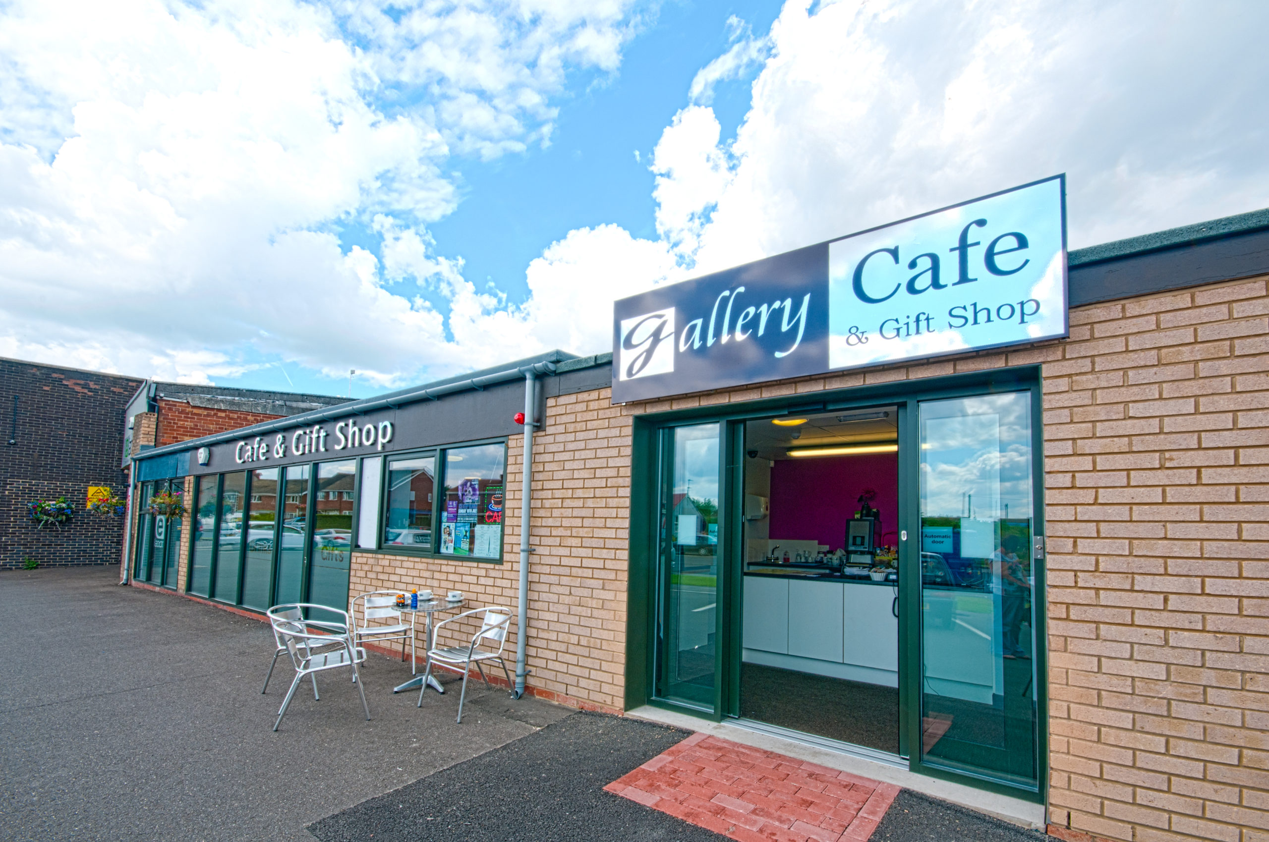 A café with tables and chairs in front of it located at 352 Pelham Road, Immingham.
