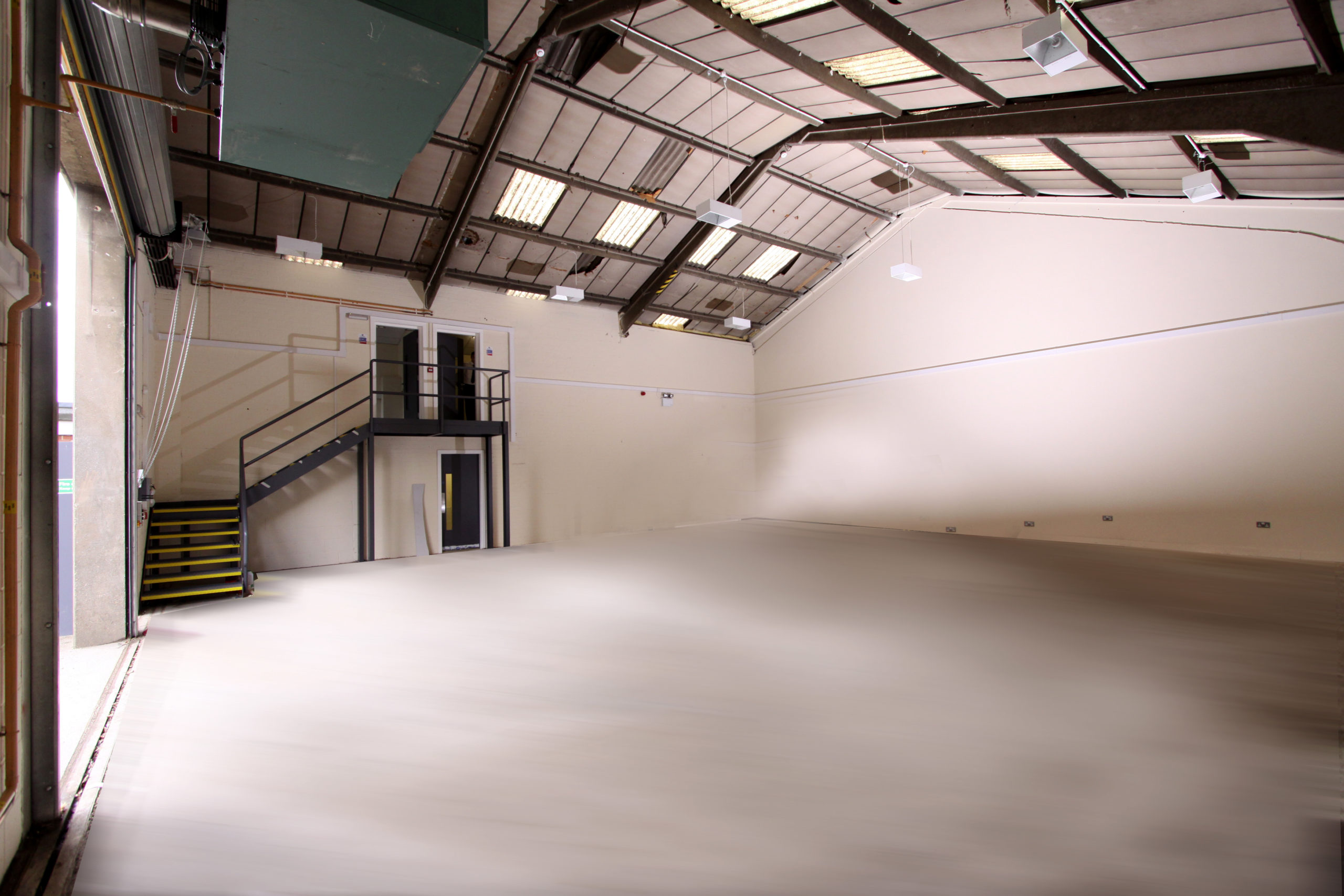 An industrial unit at 352 Pelham Road, Immingham with a large empty room and a white floor.