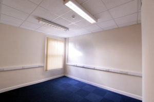 An office – F3 with blue carpet and white walls located at 64 St Peters Avenue in Cleethorpes.
