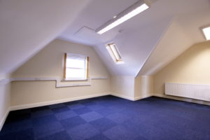 An office with a blue carpet located at 64 St Peters Avenue in Cleethorpes.