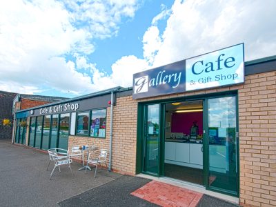 A café with tables and chairs in front of it located at 352 Pelham Road, Immingham.